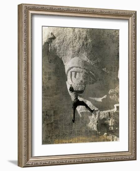 Man Hangs Onto Eye at Mount Rushmore-null-Framed Photographic Print