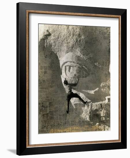 Man Hangs Onto Eye at Mount Rushmore-null-Framed Photographic Print