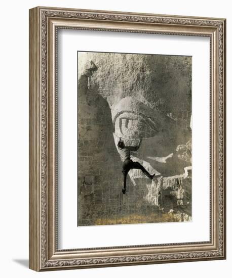 Man Hangs Onto Eye at Mount Rushmore-null-Framed Photographic Print