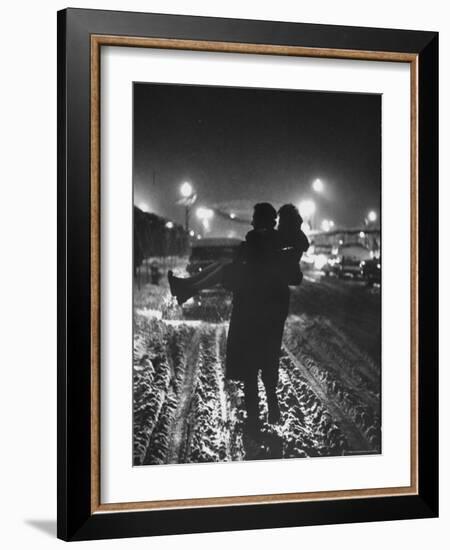 Man Helping a Girl Across the Street-George Silk-Framed Photographic Print