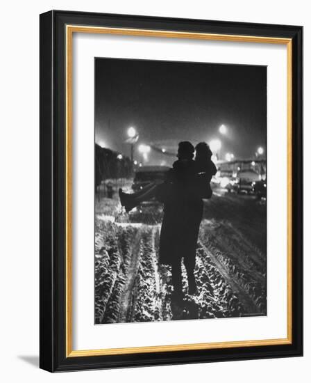 Man Helping a Girl Across the Street-George Silk-Framed Photographic Print