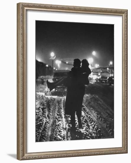 Man Helping a Girl Across the Street-George Silk-Framed Photographic Print