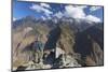 Man hiking in Tiger Leaping Gorge, UNESCO World Heritage Site, with Jade Dragon Snow Mountain (Yulo-Ian Trower-Mounted Photographic Print