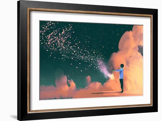 man holding a cage with floating star dust-Tithi Luadthong-Framed Art Print