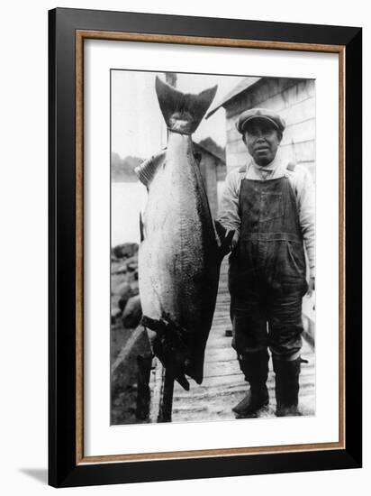 Man Holding Life Size King Salmon - Alaska-Lantern Press-Framed Art Print