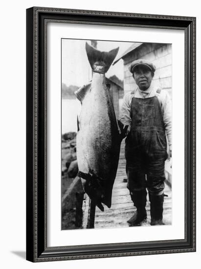 Man Holding Life Size King Salmon - Alaska-Lantern Press-Framed Art Print
