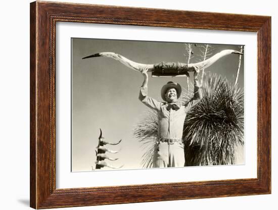 Man Holding Longhorns-null-Framed Art Print