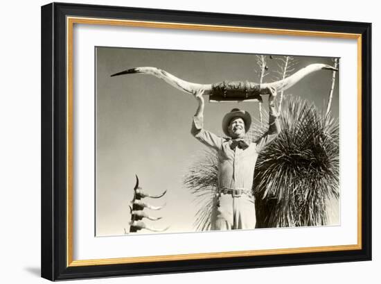 Man Holding Longhorns-null-Framed Art Print