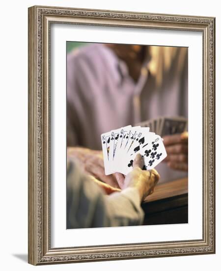 Man Holding Playing Cards-null-Framed Photographic Print
