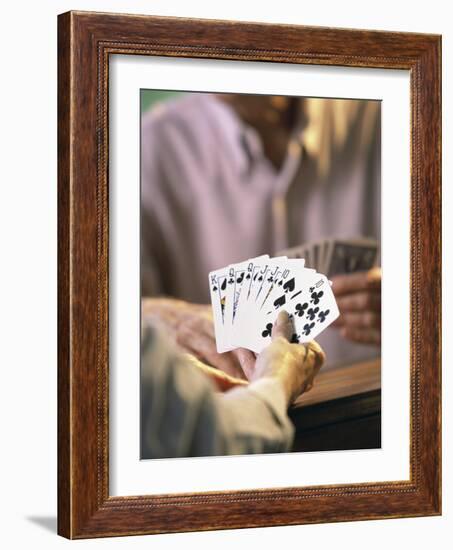 Man Holding Playing Cards-null-Framed Photographic Print