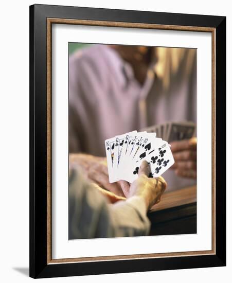 Man Holding Playing Cards-null-Framed Photographic Print