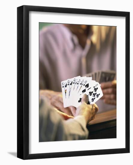 Man Holding Playing Cards-null-Framed Photographic Print