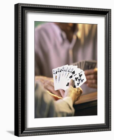 Man Holding Playing Cards-null-Framed Photographic Print