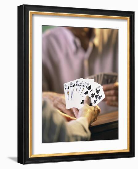 Man Holding Playing Cards-null-Framed Photographic Print