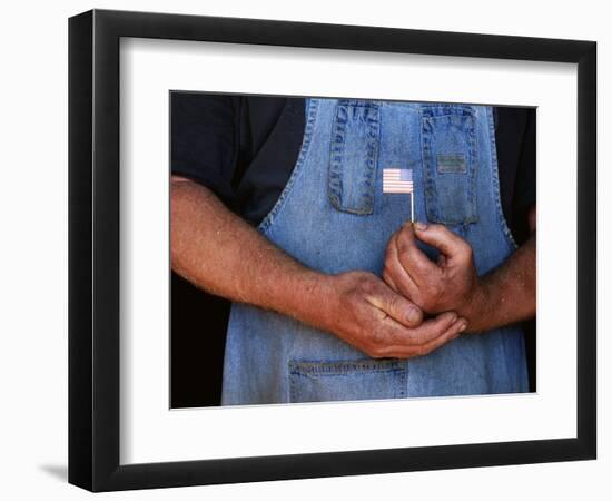 Man Holding Small American Flag-Bob Rowan-Framed Photographic Print