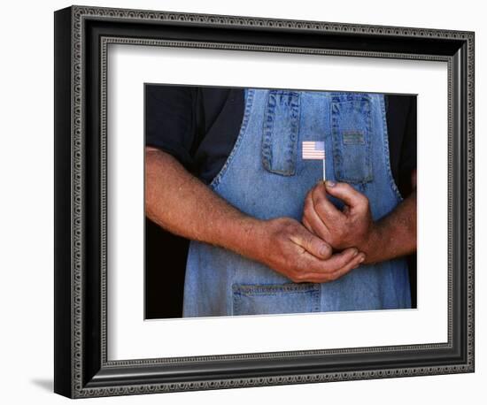 Man Holding Small American Flag-Bob Rowan-Framed Photographic Print