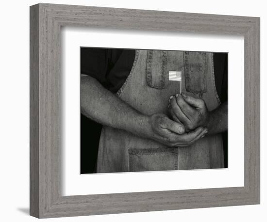 Man Holding Small American Flag-Bob Rowan-Framed Photographic Print