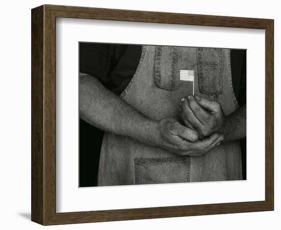 Man Holding Small American Flag-Bob Rowan-Framed Photographic Print