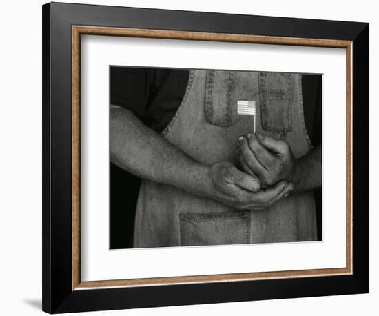 Man Holding Small American Flag-Bob Rowan-Framed Photographic Print