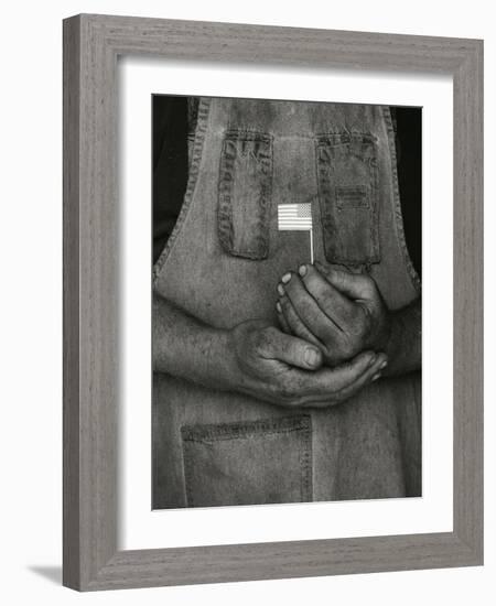 Man Holding Small American Flag-Bob Rowan-Framed Photographic Print