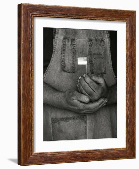 Man Holding Small American Flag-Bob Rowan-Framed Photographic Print