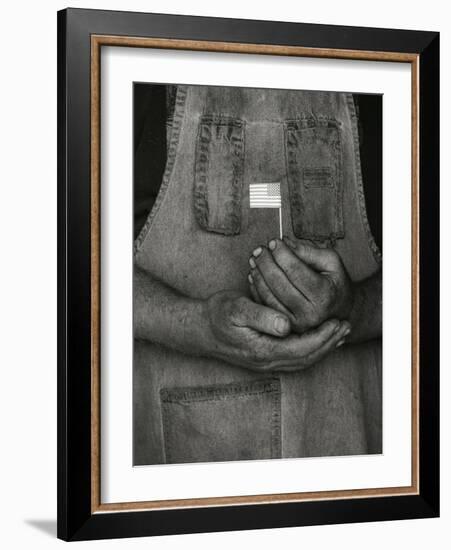 Man Holding Small American Flag-Bob Rowan-Framed Photographic Print