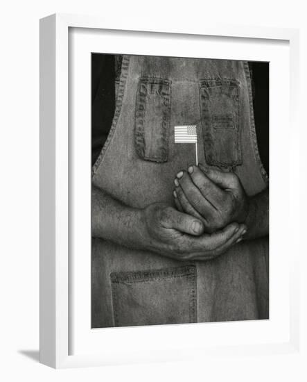 Man Holding Small American Flag-Bob Rowan-Framed Photographic Print