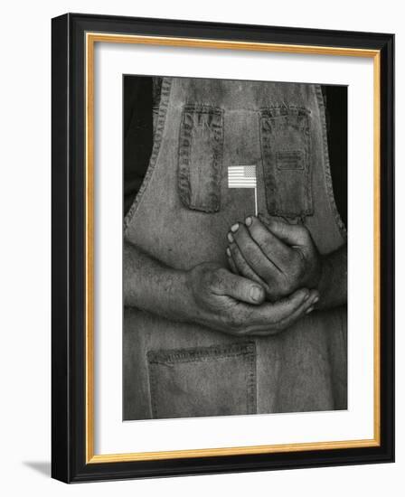 Man Holding Small American Flag-Bob Rowan-Framed Photographic Print