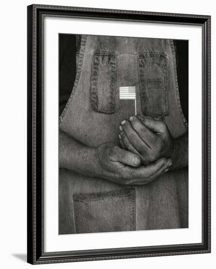 Man Holding Small American Flag-Bob Rowan-Framed Photographic Print