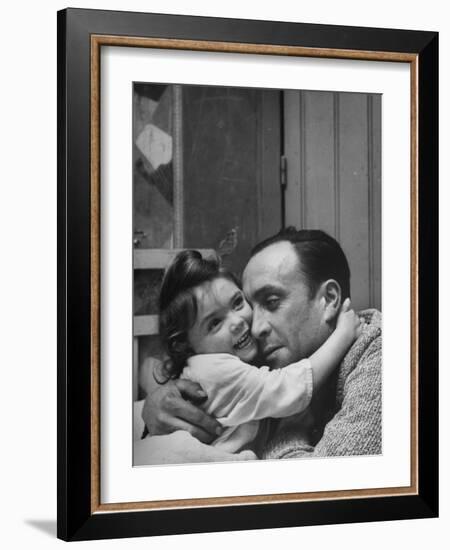 Man Hugging His Daughter-Nat Farbman-Framed Photographic Print