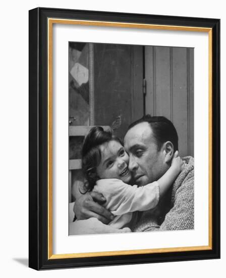 Man Hugging His Daughter-Nat Farbman-Framed Photographic Print