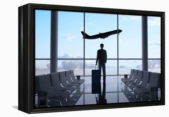 Man in Airport-g_peshkova-Framed Premier Image Canvas