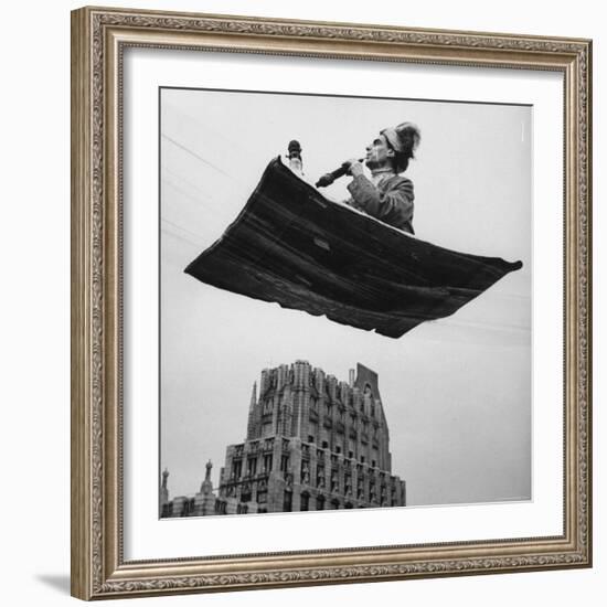 Man in Arabic Dress, Smoking a Water Cooled Pipe, is Comfortably Sitting on a Magic Carpet-Andreas Feininger-Framed Photographic Print