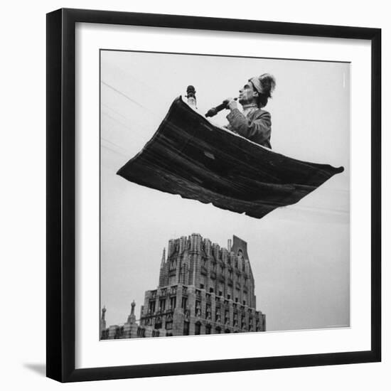 Man in Arabic Dress, Smoking a Water Cooled Pipe, is Comfortably Sitting on a Magic Carpet-Andreas Feininger-Framed Photographic Print