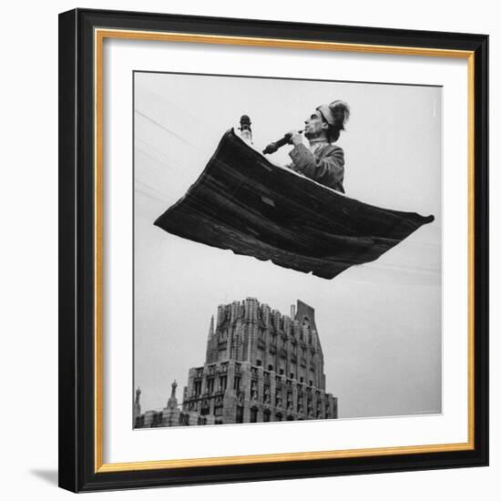 Man in Arabic Dress, Smoking a Water Cooled Pipe, is Comfortably Sitting on a Magic Carpet-Andreas Feininger-Framed Photographic Print