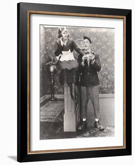 Man in Clown Shoes Proposes to Maid-null-Framed Photo