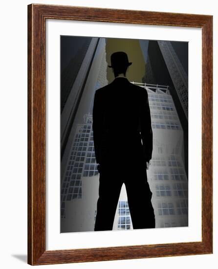 Man in Suit and Bowler Hat Standing in Front of Skyscraper-null-Framed Photographic Print