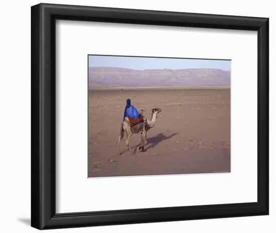 Man in Traditional Dress Riding Camel, Morocco-Merrill Images-Framed Photographic Print