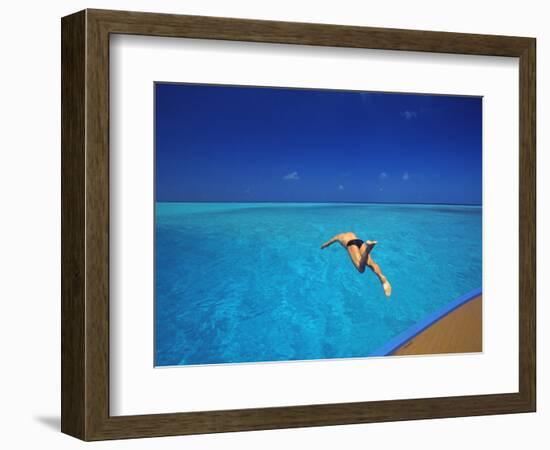 Man Jumping into Tropical Sea from Deck, Maldives, Indian Ocean-Papadopoulos Sakis-Framed Photographic Print