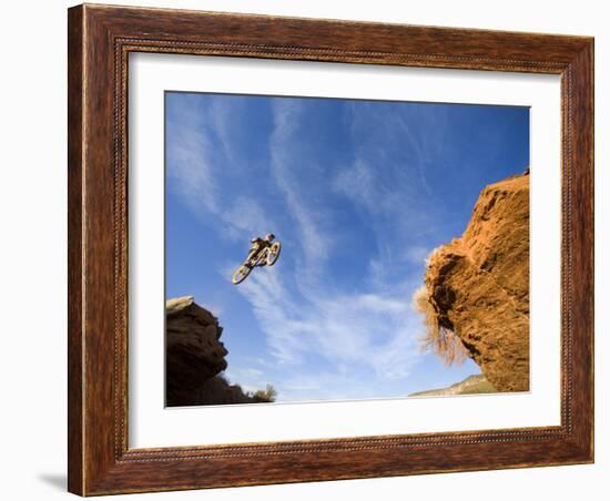 Man Jumps Gap at Red Bull Rampage Site, Virgin, Utah, USA-Chuck Haney-Framed Photographic Print