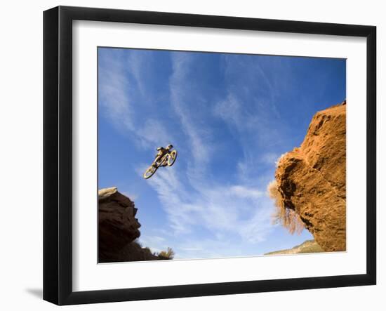 Man Jumps Gap at Red Bull Rampage Site, Virgin, Utah, USA-Chuck Haney-Framed Photographic Print