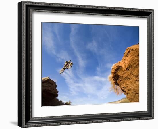 Man Jumps Gap at Red Bull Rampage Site, Virgin, Utah, USA-Chuck Haney-Framed Photographic Print