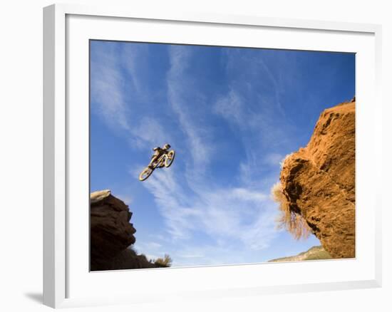 Man Jumps Gap at Red Bull Rampage Site, Virgin, Utah, USA-Chuck Haney-Framed Photographic Print