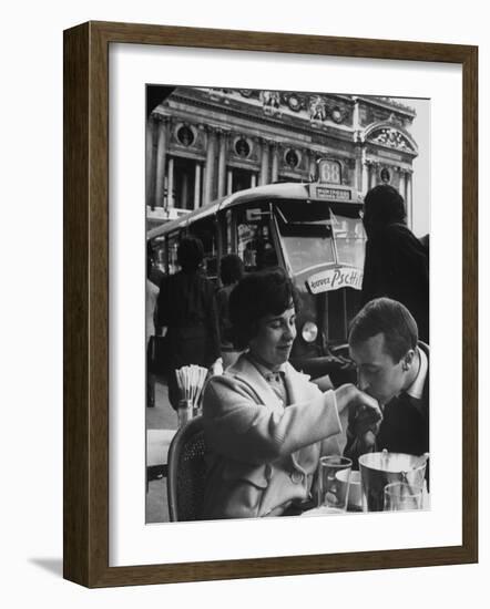 Man Kissing Woman's Hand at the Cafe de La Place de L'Opera-Loomis Dean-Framed Photographic Print