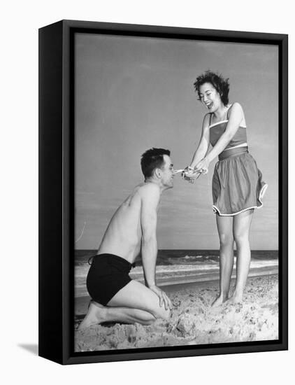 Man Laughing While a Small Crab Prepares to Snip His Nose-William C^ Shrout-Framed Premier Image Canvas