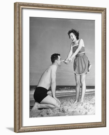 Man Laughing While a Small Crab Prepares to Snip His Nose-William C^ Shrout-Framed Photographic Print
