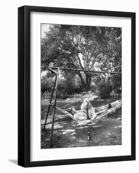 Man Laying in a Hammock with a Beer Beside Him-Frank Scherschel-Framed Photographic Print