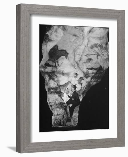 Man Looking at Prehistoric Cave Painting-Ralph Morse-Framed Photographic Print