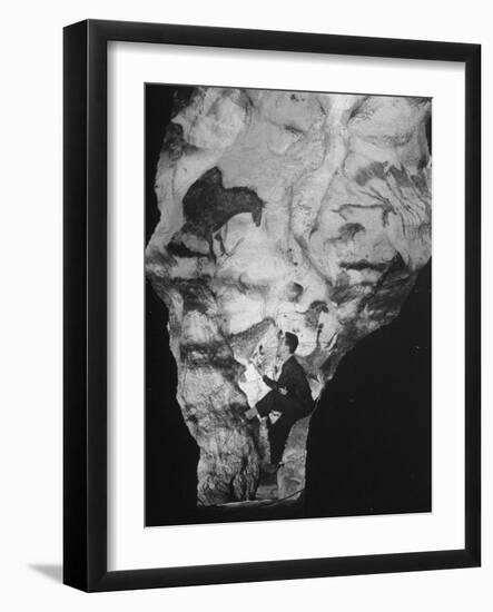 Man Looking at Prehistoric Cave Painting-Ralph Morse-Framed Photographic Print