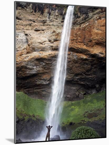 Man Looks Up at Sipi Falls, Uganda, East Africa, Africa-Andrew Mcconnell-Mounted Photographic Print